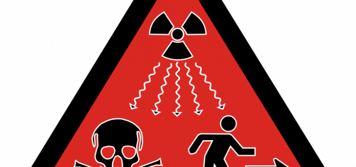 Doplňkový výstražný symbol ionizujícího záření schválený dne 15. února 2007 Mezinárodní agenturou pro atomovou energii (IAEA) a Mezinárodní organizací pro normalizaci (ISO)